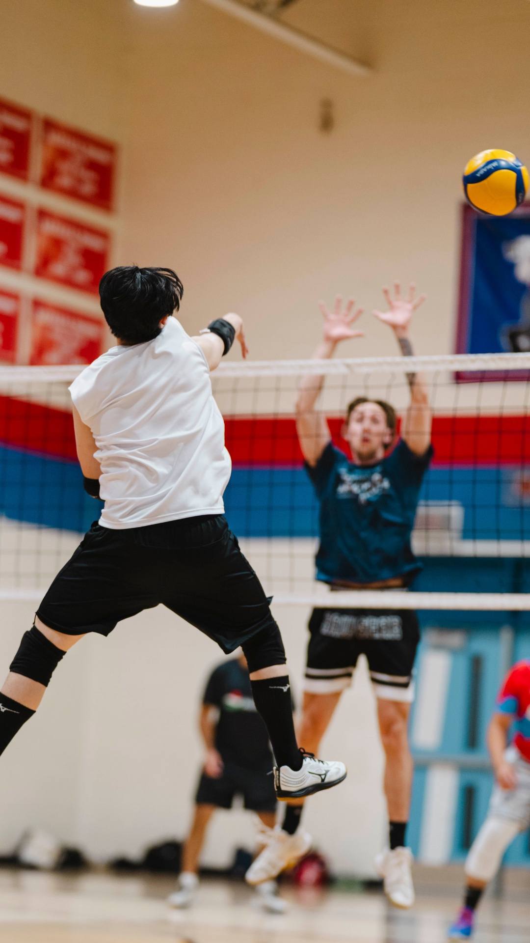 Players between sets at a league night
